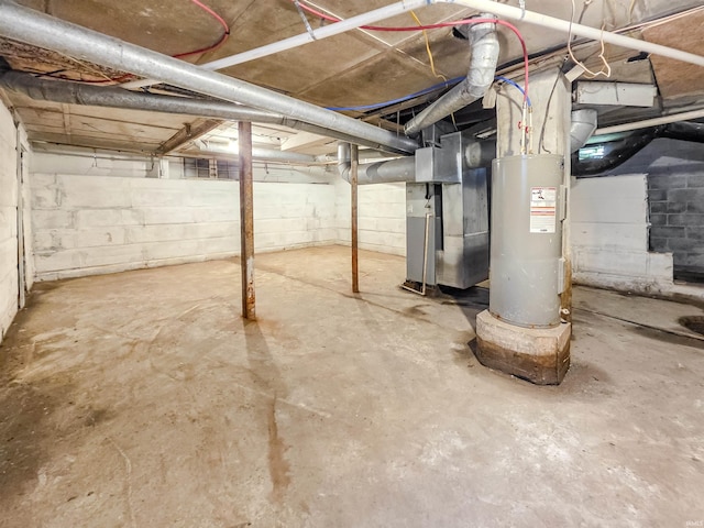 290 NW G St, Linton, IN 47441 - unfinished below grade area featuring water heater