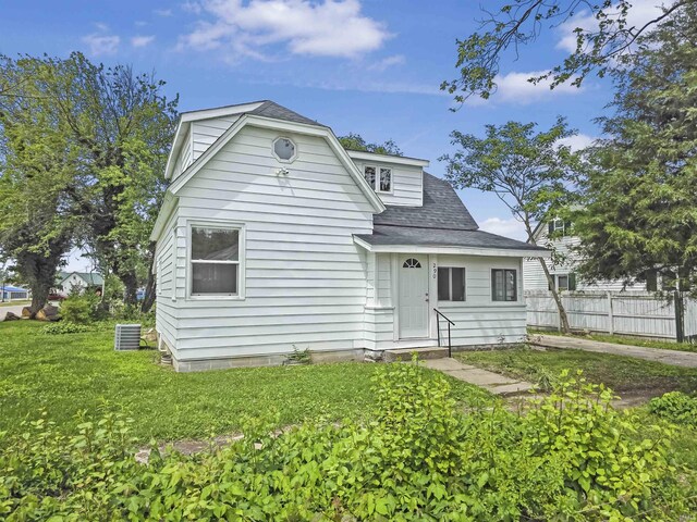 290 NW G St, Linton, IN 47441 - rear view of house with a shingled roof and central air condition unit