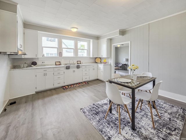 290 NW G St, Linton, IN 47441 - dining space featuring crown molding and light wood finished floors