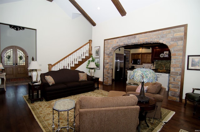 113 Lakewood Dr, Vincennes, IN 47591 - living area featuring beamed ceiling, arched walkways, dark wood-style flooring, high vaulted ceiling, and stairway
