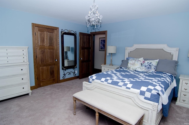 113 Lakewood Dr, Vincennes, IN 47591 - bedroom with light colored carpet and a chandelier