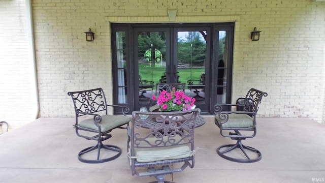 113 Lakewood Dr, Vincennes, IN 47591 - view of patio featuring french doors