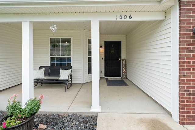1606 Waverly Dr, Lafayette, IN 47909 - doorway to property with brick siding and covered porch