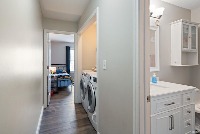 1606 Waverly Dr, Lafayette, IN 47909 - laundry room featuring washer and dryer, dark wood-style floors, and baseboards