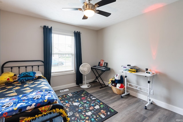 1606 Waverly Dr, Lafayette, IN 47909 - bedroom featuring wood finished floors, baseboards, and a ceiling fan