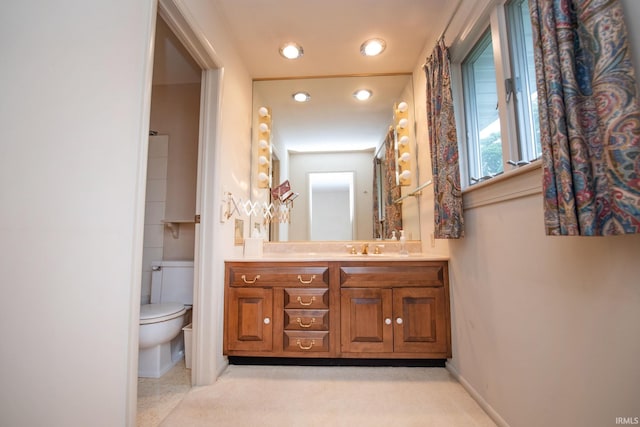 1301 E 4th St, Fowler, IN 47944 - bathroom with toilet, vanity, baseboards, and recessed lighting