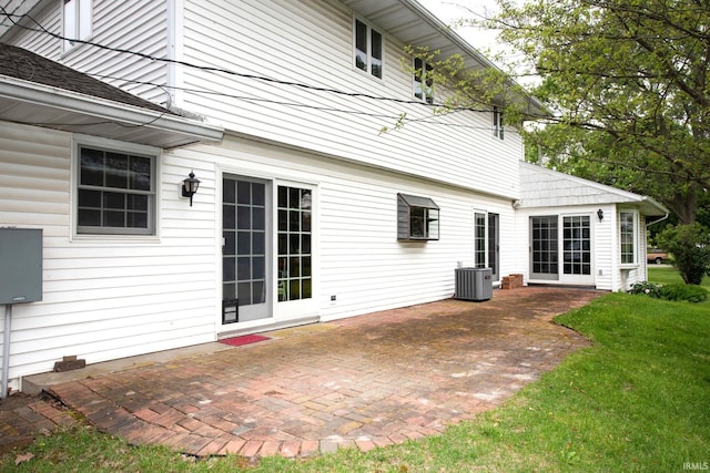 1301 E 4th St, Fowler, IN 47944 - rear view of house with a patio area, central air condition unit, and a yard