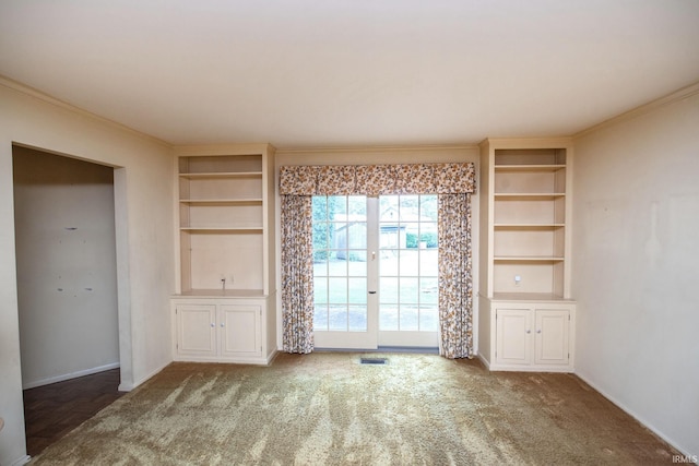 1301 E 4th St, Fowler, IN 47944 - empty room with built in features, ornamental molding, baseboards, and carpet