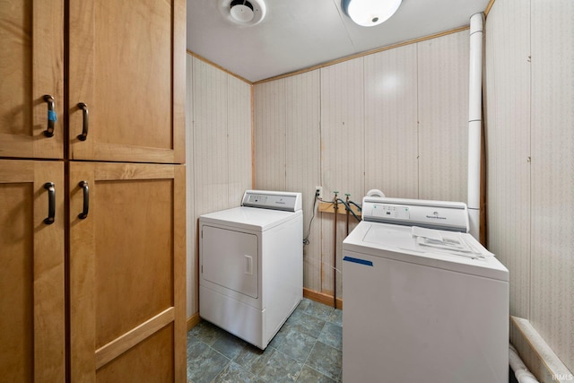 51662 Kenilworth Rd, South Bend, IN 46637 - laundry room featuring washer and dryer, cabinet space, and wallpapered walls