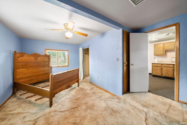 51662 Kenilworth Rd, South Bend, IN 46637 - bedroom featuring light carpet, a sink, and baseboards