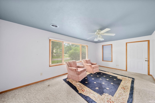 51662 Kenilworth Rd, South Bend, IN 46637 - living area with baseboards, carpet, and ceiling fan