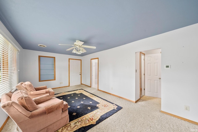 51662 Kenilworth Rd, South Bend, IN 46637 - carpeted living room featuring baseboards and a ceiling fan