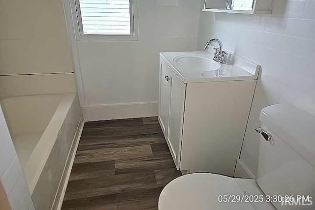 121 Altgeld St, South Bend, IN 46614 - bathroom with toilet, vanity, and healthy amount of natural light
