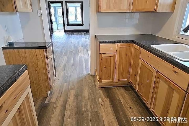 121 Altgeld St, South Bend, IN 46614 - kitchen featuring dark wood-style floors and dark countertops