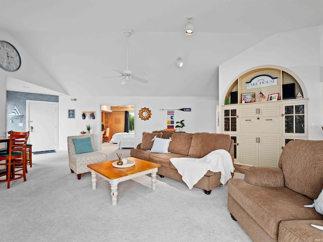 10660 N Southshore Dr Unit D3, Syracuse, IN 46567 - living room with lofted ceiling, carpet flooring, and a ceiling fan