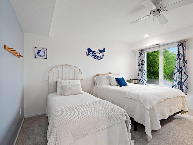 10660 N Southshore Dr Unit D3, Syracuse, IN 46567 - carpeted bedroom featuring ceiling fan, baseboards, and access to exterior