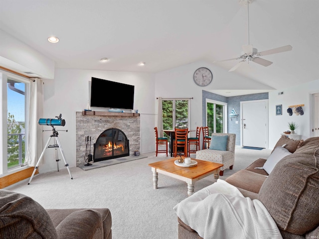 10660 N Southshore Dr Unit D3, Syracuse, IN 46567 - carpeted living room featuring healthy amount of natural light, vaulted ceiling, a fireplace, ceiling fan, and recessed lighting