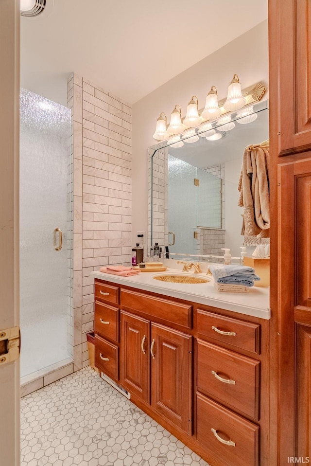 1023 Sunset Dr, Wabash, IN 46992 - bathroom with a shower stall, vanity, and tile patterned floors
