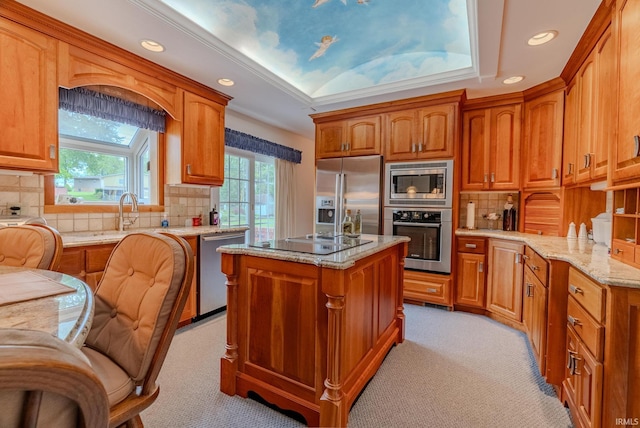 1023 Sunset Dr, Wabash, IN 46992 - kitchen with stainless steel appliances, light colored carpet, recessed lighting, a sink, and tasteful backsplash