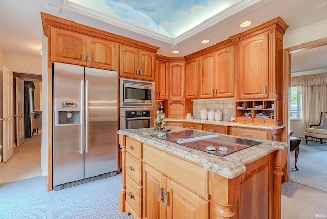 1023 Sunset Dr, Wabash, IN 46992 - kitchen featuring stainless steel appliances, light colored carpet, ornamental molding, light stone countertops, and a kitchen island