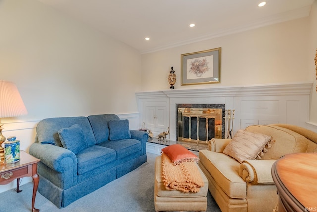 1023 Sunset Dr, Wabash, IN 46992 - living room featuring carpet, wainscoting, a decorative wall, recessed lighting, and crown molding