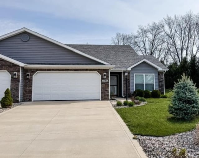 3981 Gussie Ct, Warsaw, IN 46582 - ranch-style house with driveway, a garage, and a front lawn