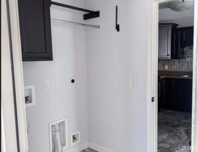 3981 Gussie Ct, Warsaw, IN 46582 - washroom with washer hookup, hookup for an electric dryer, and baseboards
