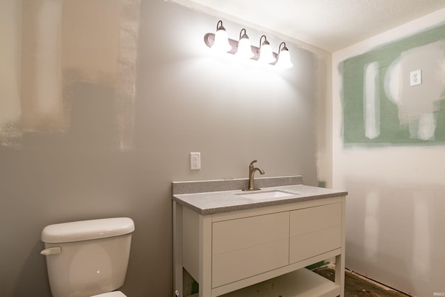 2075 N Russell Rd, Bloomington, IN 47408 - bathroom featuring toilet and vanity