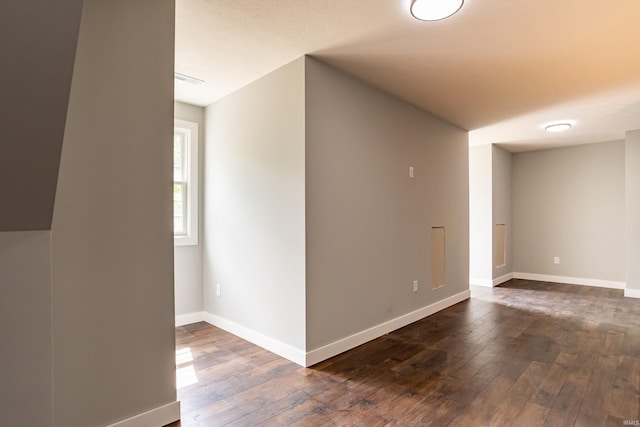 2075 N Russell Rd, Bloomington, IN 47408 - unfurnished room with dark wood finished floors and baseboards