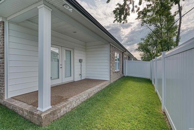 8599 Pebble Creek Dr, Newburgh, IN 47630 - view of yard with french doors and a patio area