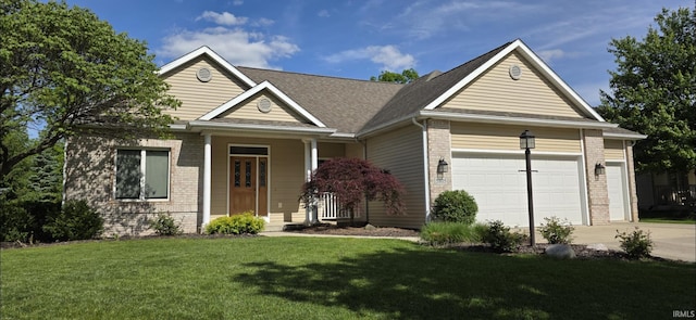 5805 Hemingway Run, Fort Wayne, IN 46814 - view of front of home featuring brick siding, driveway, a front lawn, and a garage