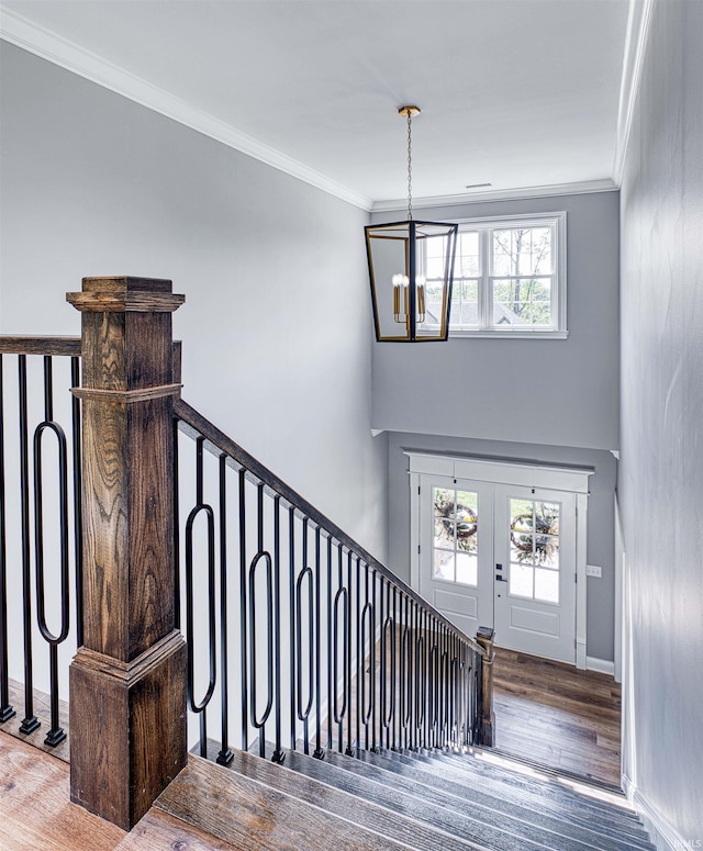 1595 Victoria Woods Dr, Boonville, IN 47601 - entrance foyer featuring a chandelier, wood finished floors, ornamental molding, baseboards, and a high ceiling
