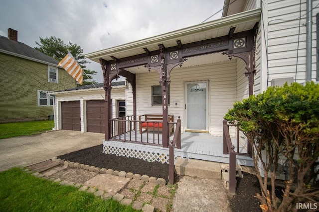 819 Spring St, New Castle, IN 47362 - view of front facade with a porch, an attached garage, and concrete driveway