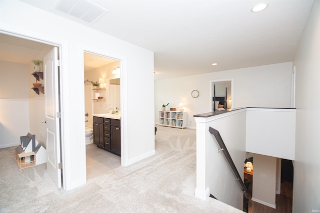 2184 Ringneck Rd, West Lafayette, IN 47906 - hall featuring an upstairs landing, light colored carpet, and recessed lighting