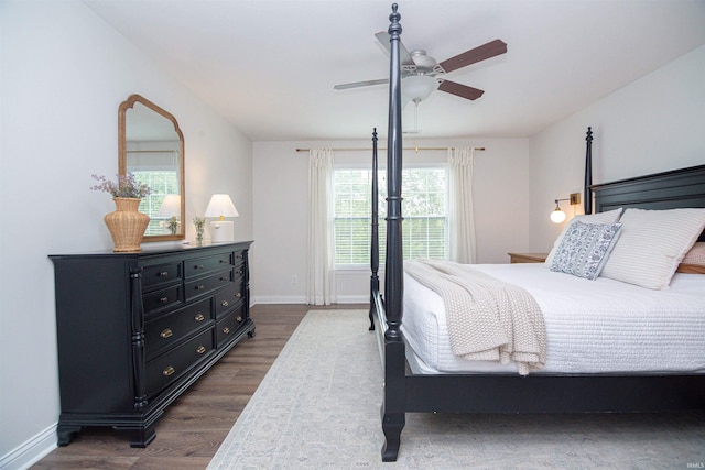 2184 Ringneck Rd, West Lafayette, IN 47906 - bedroom with dark wood finished floors, baseboards, and a ceiling fan