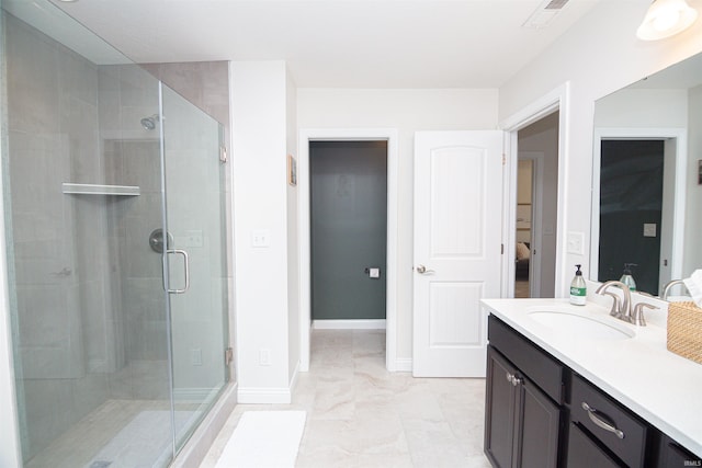 2184 Ringneck Rd, West Lafayette, IN 47906 - full bathroom with connected bathroom, vanity, a stall shower, and baseboards