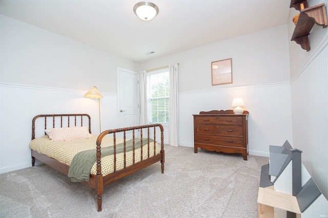 2184 Ringneck Rd, West Lafayette, IN 47906 - bedroom with carpet and a wainscoted wall