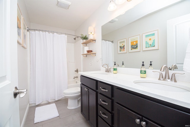 2184 Ringneck Rd, West Lafayette, IN 47906 - bathroom featuring double vanity, toilet, shower / bathtub combination with curtain, and tile patterned floors