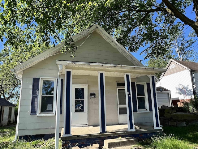 216 W Walnut St, Boonville, IN 47601 - view of front of property featuring a porch and crawl space
