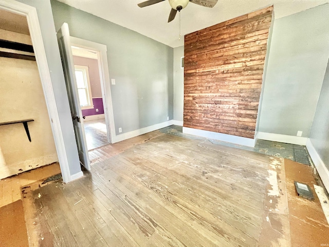 216 W Walnut St, Boonville, IN 47601 - unfurnished room featuring ceiling fan, hardwood / wood-style flooring, and baseboards