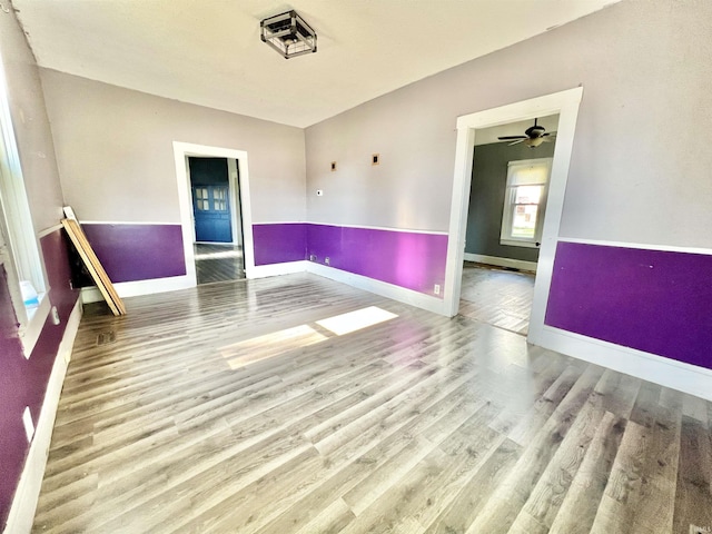 216 W Walnut St, Boonville, IN 47601 - unfurnished room featuring wood finished floors and baseboards