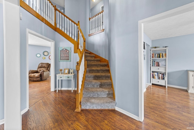 2034 Windflower Pl, West Lafayette, IN 47906 - stairs featuring wood finished floors and baseboards