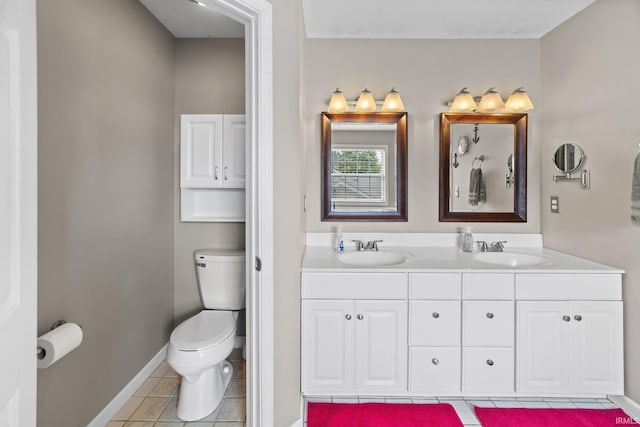 2034 Windflower Pl, West Lafayette, IN 47906 - full bathroom with tile patterned floors, toilet, double vanity, and baseboards