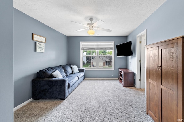 2034 Windflower Pl, West Lafayette, IN 47906 - living area with light colored carpet, a ceiling fan, baseboards, and a textured ceiling