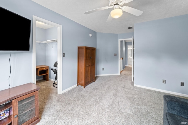 2034 Windflower Pl, West Lafayette, IN 47906 - bedroom featuring light carpet, a closet, baseboards, and a walk in closet