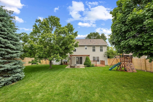 2034 Windflower Pl, West Lafayette, IN 47906 - back of house featuring a playground and a patio