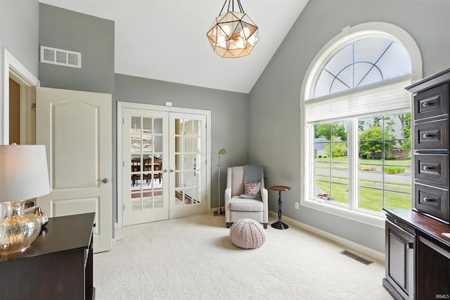 101 Twin Eagles Blvd W, Huntertown, IN 46748 - sitting room with light carpet, baseboards, and high vaulted ceiling