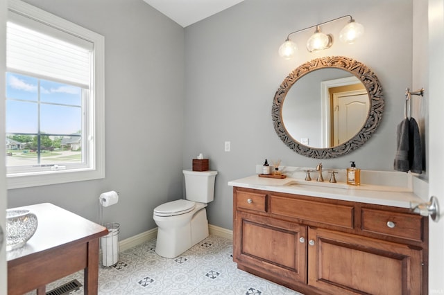 101 Twin Eagles Blvd W, Huntertown, IN 46748 - bathroom featuring vanity, toilet, and baseboards