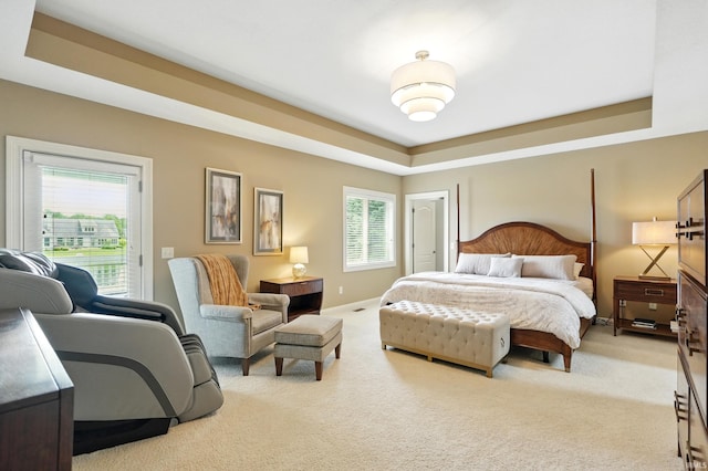 101 Twin Eagles Blvd W, Huntertown, IN 46748 - carpeted bedroom with access to outside and a raised ceiling