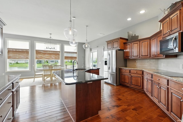 101 Twin Eagles Blvd W, Huntertown, IN 46748 - kitchen featuring stainless steel appliances, a sink, tasteful backsplash, dark wood finished floors, and recessed lighting